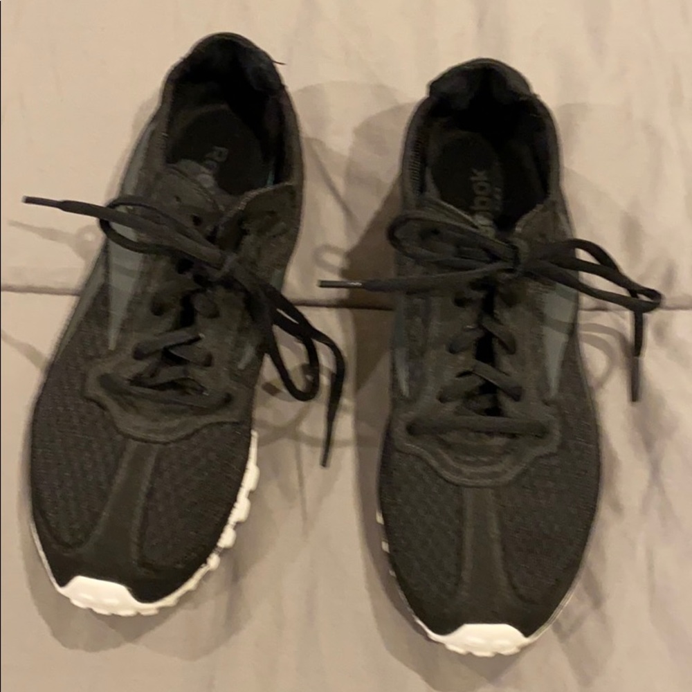 Reebok black with white sole sneakers